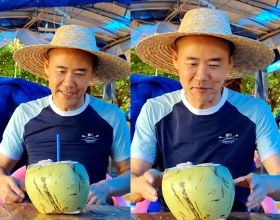 70歲王石戴草帽度假！街頭喝椰子水灑一身，大口啃木瓜好接地氣