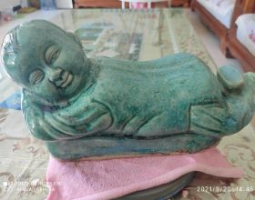 金代定窯綠釉孩兒枕頭（公元1250年左右作品）國寶一級