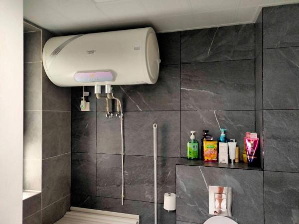 換了臺電熱水器才知道：溫水量和容量有關係，但不是主要關係