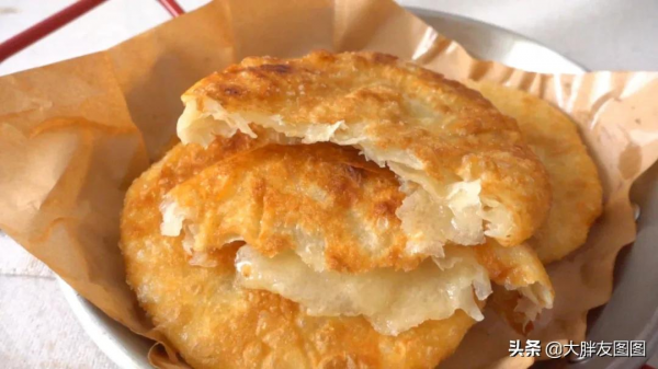 冬天最愛吃熱乎乎的糖餅,不用發麵,在家做超簡單,層層起酥 冬天最愛吃熱乎乎的糖餅,不用發麵,在家做超簡單,層層起酥