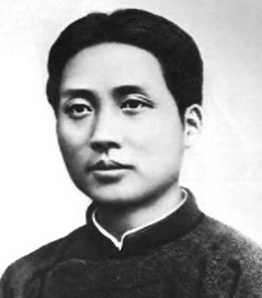 59年毛主席回韶山，見父母墳墓年久失修長了雜草，毛主席小心清理