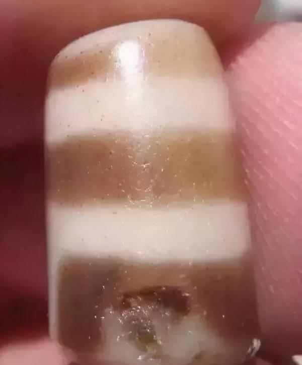 天珠上的崩口，飛皮，老磨和挖藥