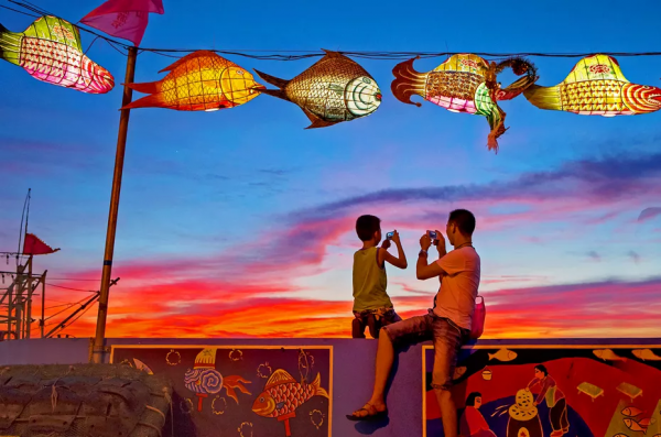 在浙江的燈影裡，搖醒一個春天