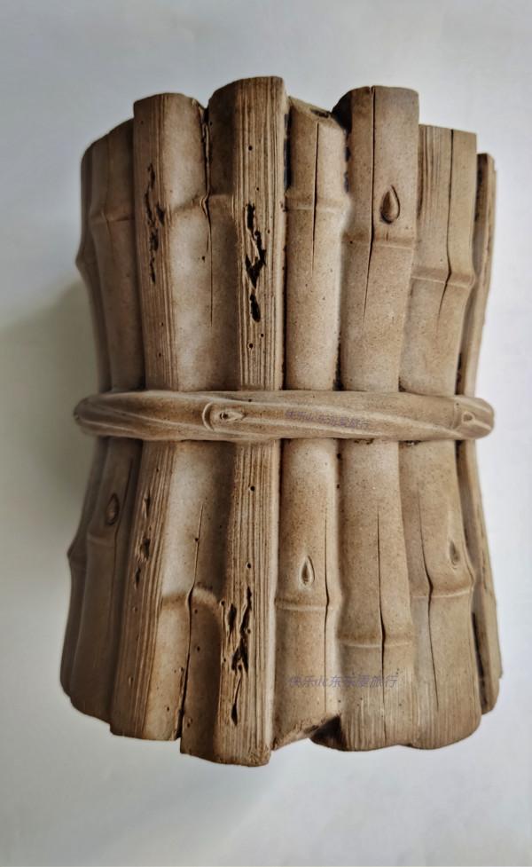 梅縣謝伯花10萬元買個仿清代筆筒，竹片加水泥製成？還說不後悔