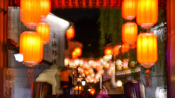 在浙江的燈影裡，搖醒一個春天