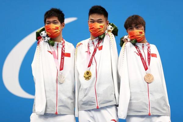 雲南90後少年，失去雙臂身殘志堅，八年磨一劍身披國旗征戰賽場