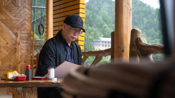 把畫掛在人民大會堂的廣東人