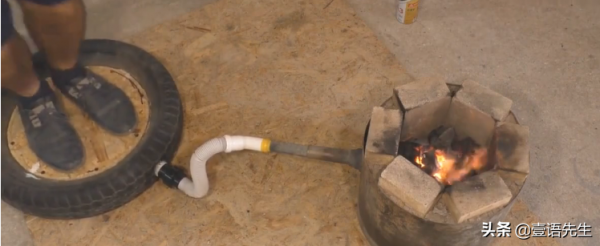 小夥用輪胎和鐵桶做取暖器，不用電，還鍛鍊身體，房間暖和了