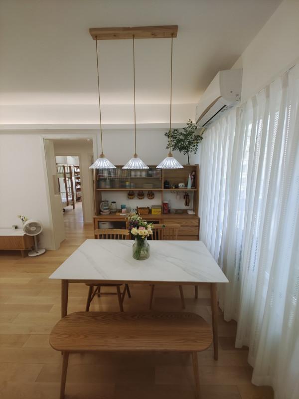 65㎡奶油色和原木色搭配，打造自然舒適的家