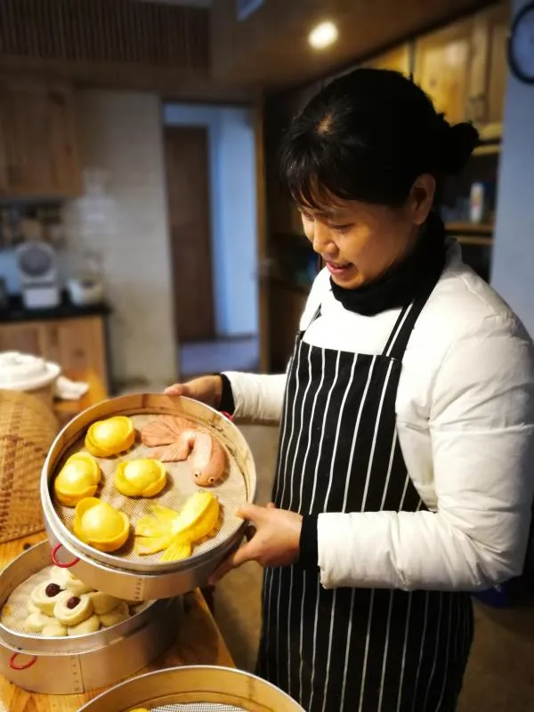 西溪南村：虎樣花饃年味足