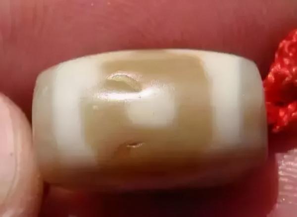 天珠上的崩口，飛皮，老磨和挖藥