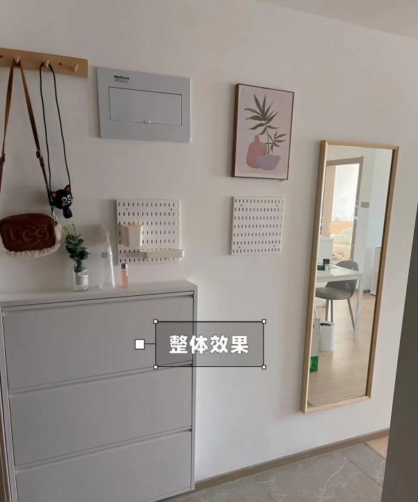 她家只有55平米，全屋裝修成大白牆，陽臺做拱門，鄰居都直呼好看