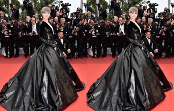 李宇春穿裙裝的品位“有點迷”，綠色長裙加誇張墊肩，前衛過頭了