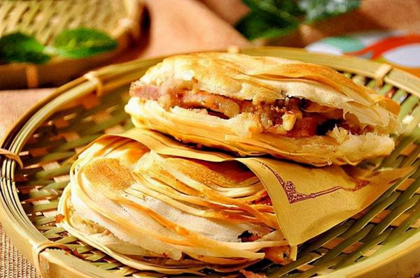 來陝西必吃的十大美食——臘汁肉夾饃 來陝西必吃的十大美食——臘汁肉夾饃