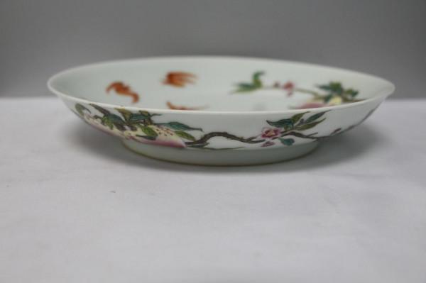 雍正“粉彩過枝桃樹紋盤”