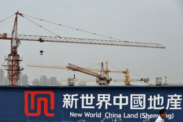 港資房企逢低入市 趁機拿地