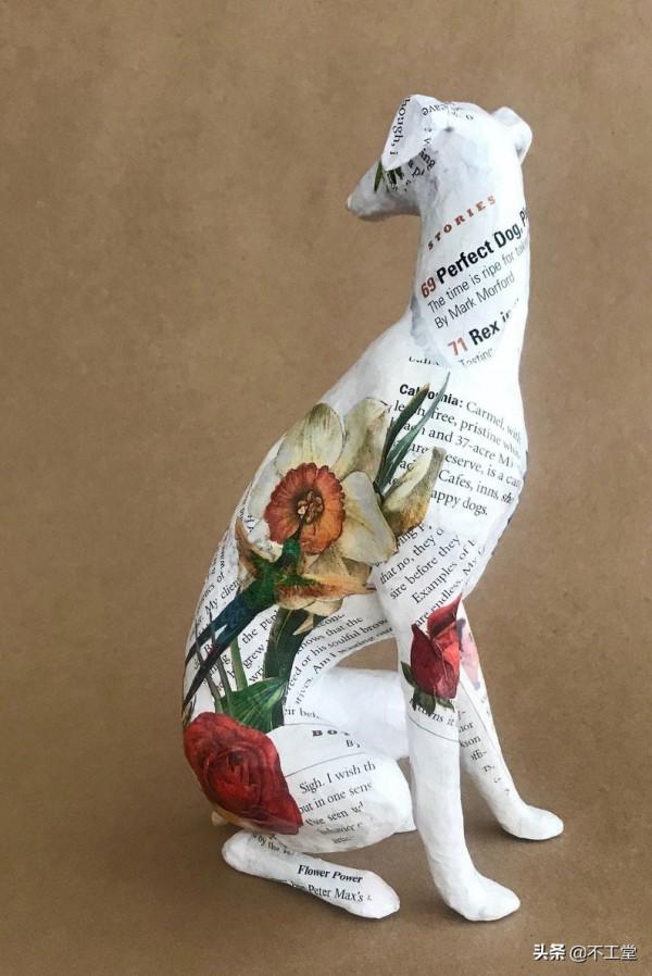 舊雜誌創作的狗狗雕像 舊雜誌創作的狗狗雕像