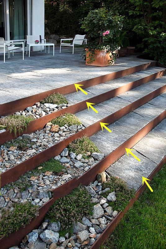 庭院做成階梯式，不用打水泥，廢舊金屬框填滿石礫，一層又一層