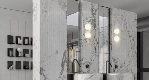 這個裝修想法很有創意，入戶用大理石隔斷做端景牆