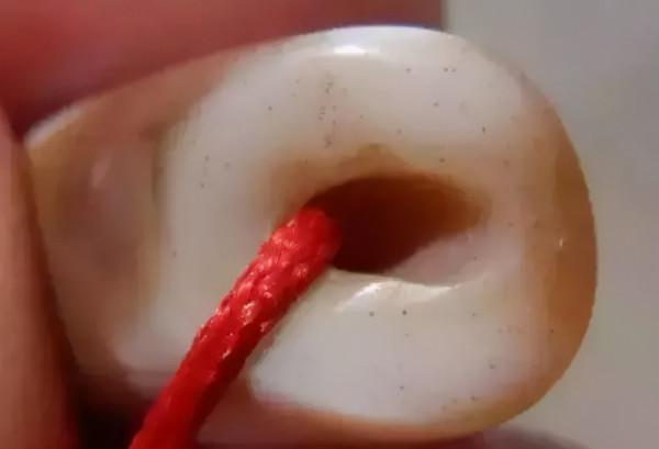 天珠上的崩口，飛皮，老磨和挖藥