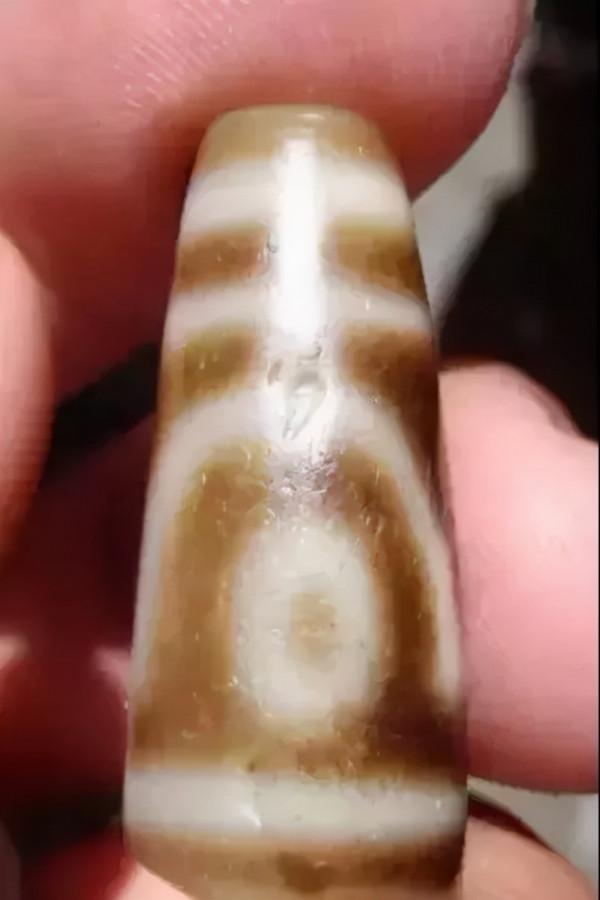 天珠上的崩口，飛皮，老磨和挖藥