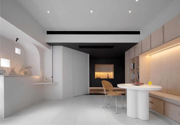 49平米的公寓改變成工作區，滿足功能需求，並引入光影效果