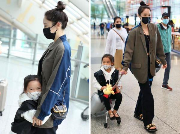 董璇母女同穿桃心長褲，灰色拼接西裝丸子頭，小酒窩抱腰撒嬌萌化