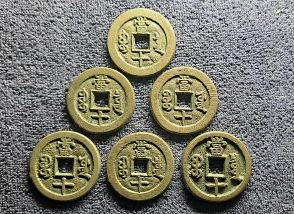 古錢幣是否可以清洗？