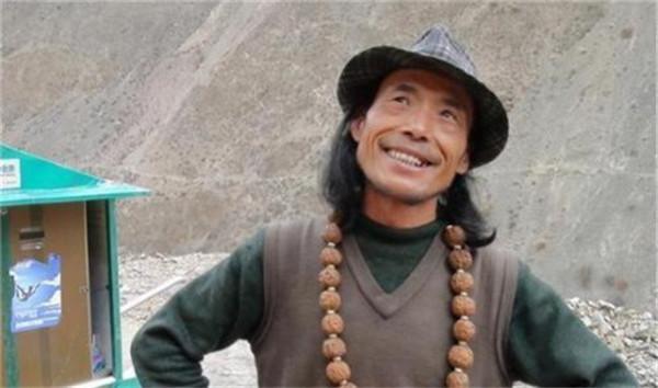 “徒步狂人”謝建光：35年拉板車走30萬公里，59歲止步黑河