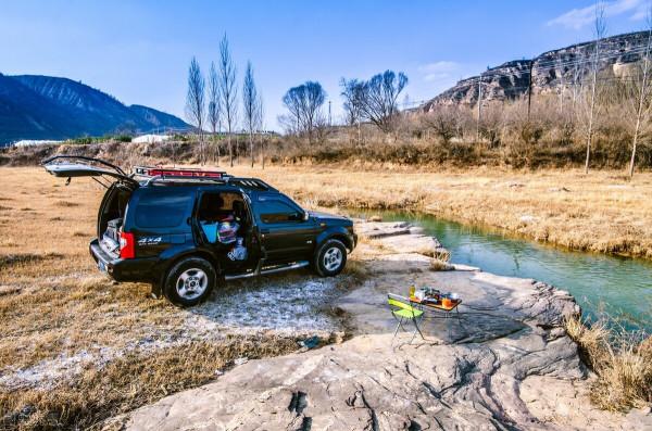 題羨老陽攜酒旅釣四方