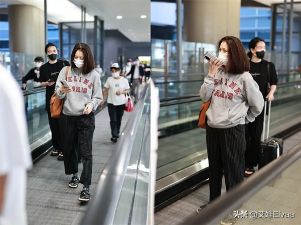 袁詠儀獨自走機場，穿衛衣配涼拖鞋老公不在變頹廢，黑眼圈好明顯