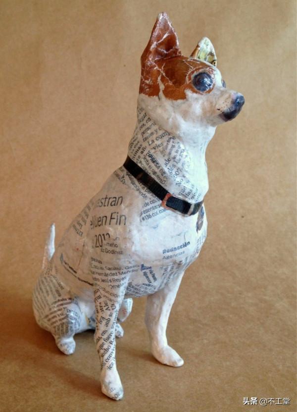 舊雜誌創作的狗狗雕像 舊雜誌創作的狗狗雕像