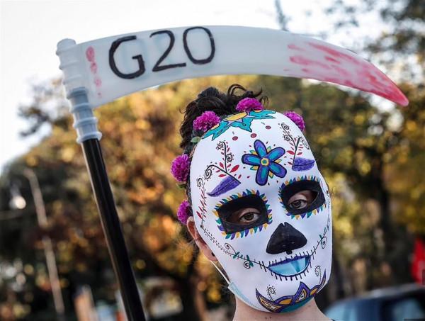 G20晚宴細節多：美英法領導人坐得遠，場外還有數千人抗議
