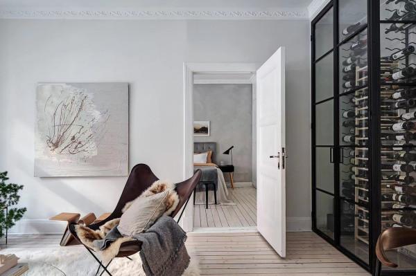 以白色為主題的北歐風小戶型公寓,非常素淨,置頂酒櫃和收納櫃 以白色為主題的北歐風小戶型公寓,非常素淨,置頂酒櫃和收納櫃