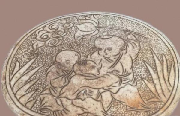 北宋登封窯珍珠地執荷童子腰形枕，宋代磁州窯瓷器