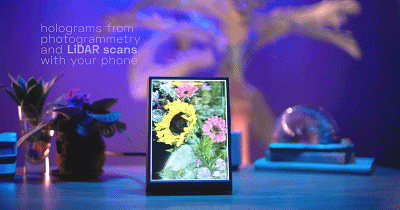 這個&OpenCurlyDoubleQuote;相框&rdquo;竟然是個全息3D顯示器，立體感十足，太酷了