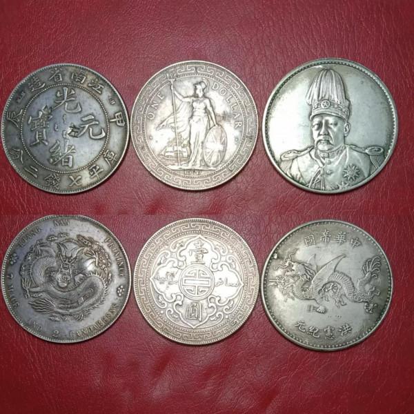 三種銀幣，請隨評