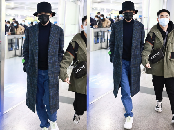 張若昀的身材“沒得說”，身穿黑色印花長棉服好帥氣，個性瀟灑