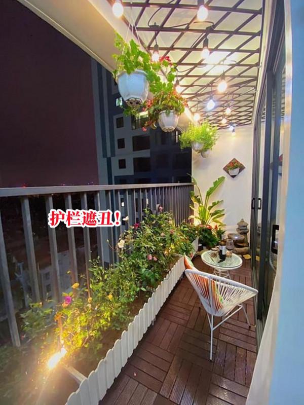 沒有院子，那就用陽臺代替，繞著護欄種一圈花圃，整棟樓獨一無二