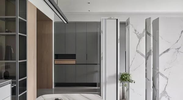 這個裝修想法很有創意，入戶用大理石隔斷做端景牆