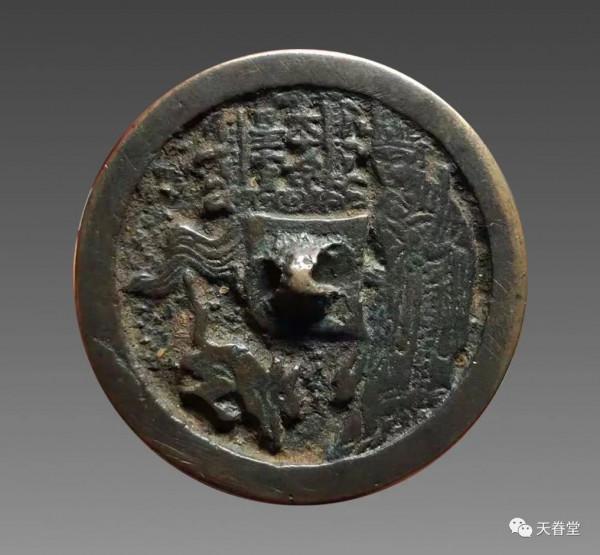 鏡子上的古錢 鏡子上的古錢