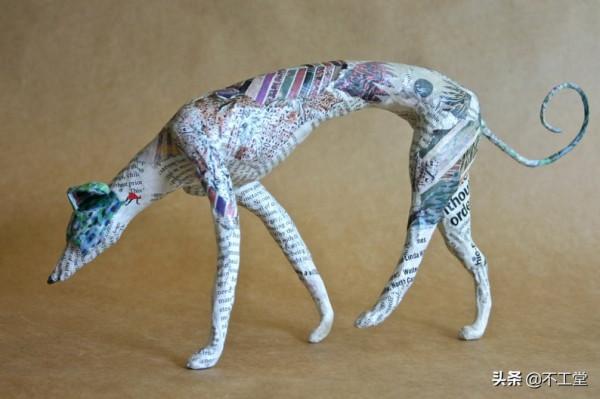 舊雜誌創作的狗狗雕像 舊雜誌創作的狗狗雕像