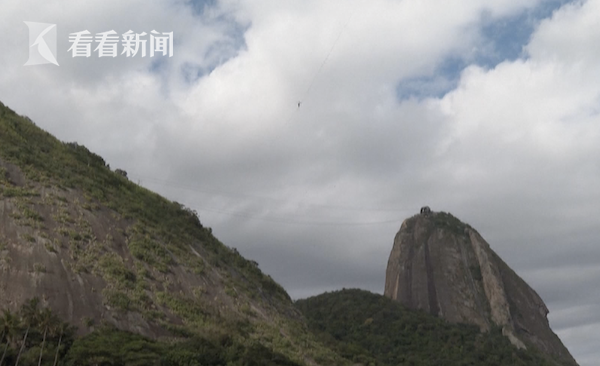 再刷紀錄！從小恐高 牛人在著名景點高空走扁擔