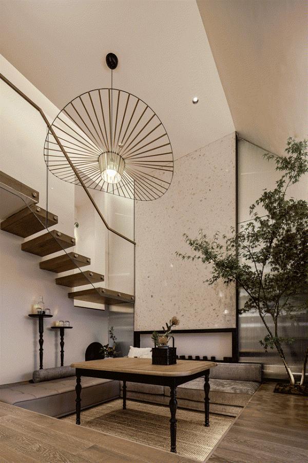 水磨石沒有過時，一整塊幹掛背景牆透光如星空，比大理石都要高檔